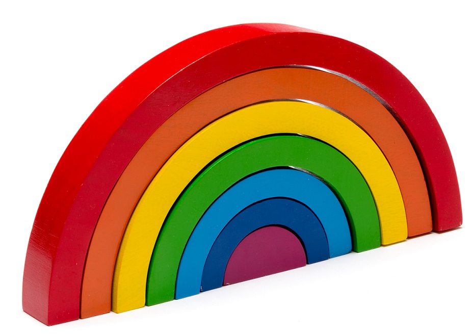 Wooden rainbow toy cut in 7 pieces of wood that fit together into a puzzle